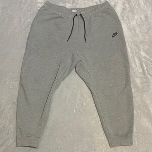 Nike men’s Light Gray Sweatpants with Black Nike Logo (Length short)